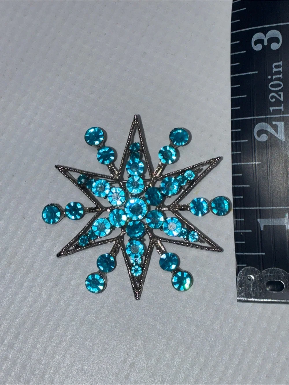 Turquoise/Blue Starburst Snowflake Brooch - silvertone
